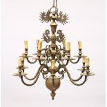 A GOOD DUTCH BRASS TWO TIER CHANDELIER with twelve scrolling branches. 2ft 6ins high x 2ft wide.