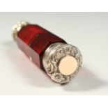A VICTORIAN FACET CUT RUBY GLASS DOUBLE ENDED SCENT BOTTLE AND VINAIGRETTE with repousse silver