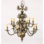 A GOOD DUTCH BRASS TWO TIER CHANDELIER with twelve scrolling branches. 2ft 6ins high x 2ft wide.