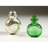 A GOOD VICTORIAN SCENT BOTTLE with folding silver case, engraved with ribbons and garlands.