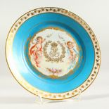 A SEVRES LOUIS PHILIPPE ARMORAIL PLATE with blue border. 9ins diameter.