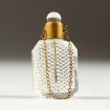 A TINY CUT GLASS SCENT BOTTLE AND STOPPER on a chain. 3.5cms.