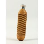 A PIERCED CANE MOUNTED SCENT BOTTLE with screw off top. 11cms long.