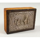 A SILVER TOP WOODEN BOX - Figures in a garden.