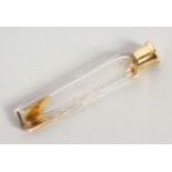 A 19TH CENTURY PLAIN CIRCULAR TAPERING SCENT BOTTLE AND STOPPER with screw off cap. 8.5cms long.