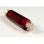A VERY GOOD VICTORIAN FACET CUT RUBY GLASS DOUBLE ENDED SCENT BOTTLE with repousse silver top and