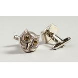 A PAIR OF SILVER OWL CUFFLINKS.