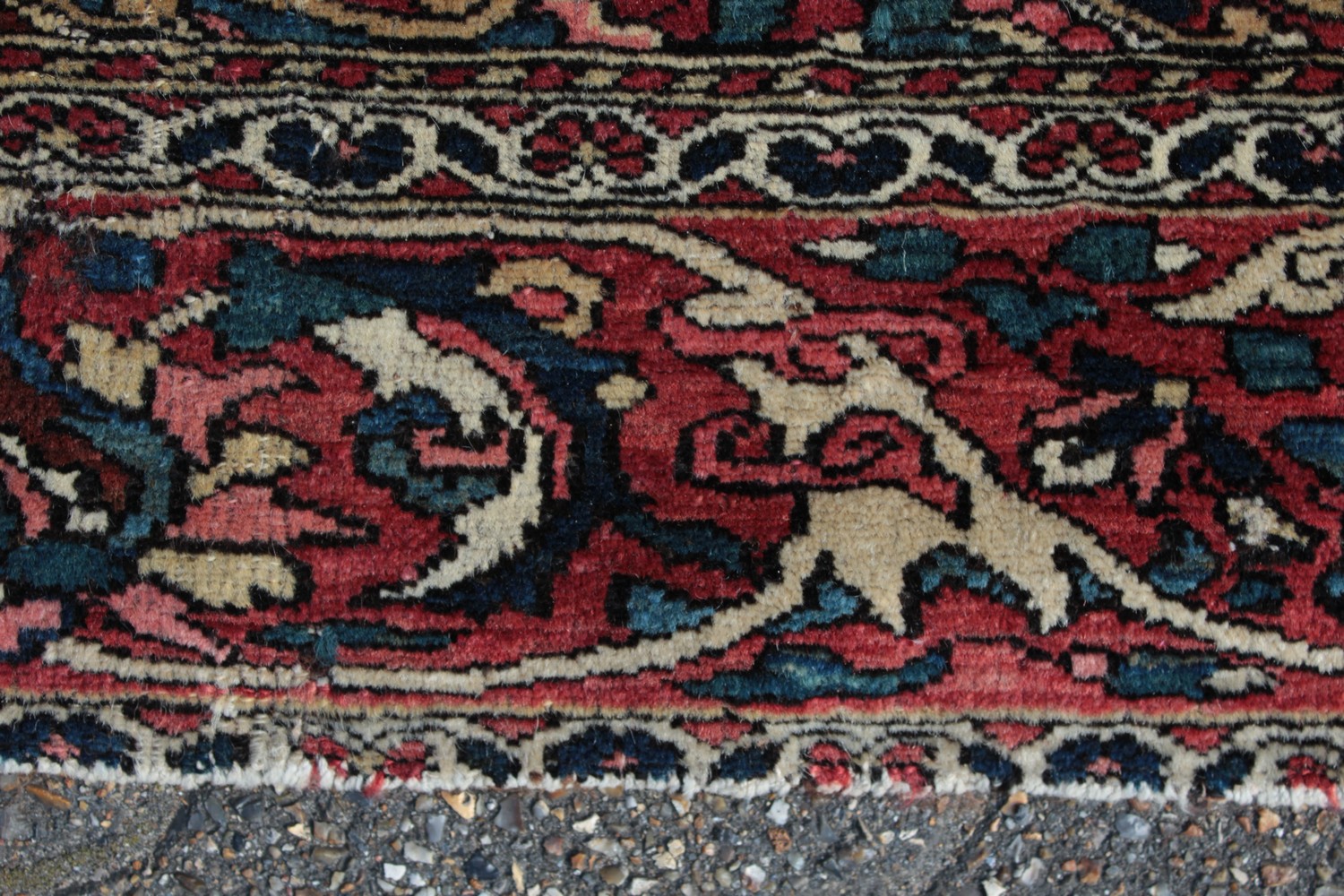 AN OLD BAKHTIARI PERSIAN RUG 1920'S-1930'S, with a large diamond shaped motif and many other motifs. - Image 6 of 9