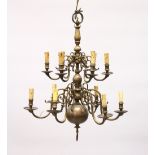 A GOOD DUTCH BRASS TWO TIER CHANDELIER with twelve scrolling branches. 2ft 5ins high x 2ft wide.