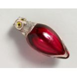 A VICTORIAN RUBY GLASS AND PLATE NOVELTY OWL SCENT BOTTLE. 6cms long.