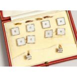 A SET OF 18CT WHITE GOLD, MOTHER-OF-PEARL AND DIAMOND CUFFLINKS AND STUDS from Harrods & Son, in a