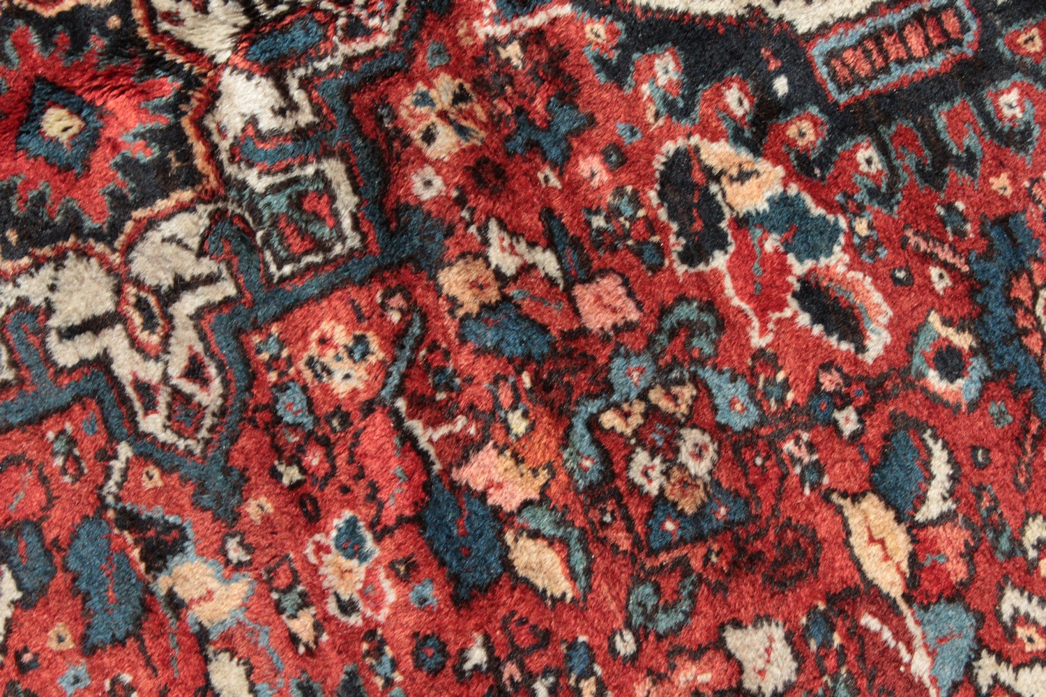 A LARGE PERSIAN KARAJA CARPET with seven central medallions in red and blue. 10ft 10ins x 7ft 4ins. - Image 3 of 11