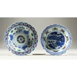 TWO CHINESE CIRCULAR COLUMN BLUE AND WHITE BOWLS with six character mark. 5ins diameter.