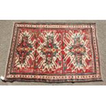 A RARE CAUCASIAN CHELEBERD RUG with Eagle design. 7ft x 4ft 10ins.