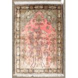 A FINE PERSIAN SILK QUM RUG with a tree pattern and mtifs to the border. 5ft 1in x 3ft 6ins.