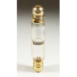 A VICTORIAN GLASS DOUBLE ENDED SCENT BOTTLE with plated tops. 13cms long.