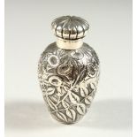 A VICTORIAN SILVER VASE SHAPED SCENT BOTTLE AND COVER repousse with flowers and leaves. Birmingham