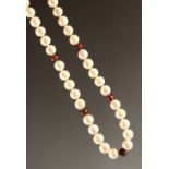 A PEARL SINGLE ROW NECKLACE with 18k GOLD CLASP.