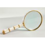 A MOTHER-OF-PEARL HANDLED MAGNIFYING GLASS.