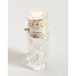 AN EDWARD VII CUT GLASS SCENT BOTTLE AND STOPPER with silver cap and band. Birmingham 1902. Maker A.