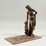 A VIENNA COLD CAST GROUP, GIRL WITH TIGER ON A RUG. 15cms high.