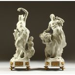 A LOVELY PAIR OF SEVRES WHITE BISCUIT PORCELAIN FIGURES of a semi-naked man and a woman depicting