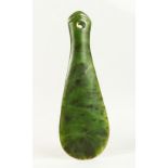 A MAORI CARVED HARDSTONE PADDLE FORM HAND CLUB, with carved and pierced end. 23cms long.