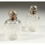A SUPERB PAIR OF VICTORIAN STEVENS & WILLIAMS CYSTAL ENGRAVED AND MOULDED GLASS SCENT BOTTLES with