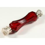 A VERY GOOD VICTORIAN FACET CUT RUBY GLASS DOUBLE ENDED SCENT BOTTLE with repousse silver top and