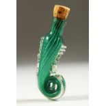 AN ITALIAN GREEN GLASS SPIRAL SHAPED SCENT BOTTLE with cork stopper. 7.5cms long.