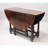 AN 18TH CENTURY OAK OVAL DROP FLAP DINING TABLE with bobbin turned gate leg action. 4ft 5ins
