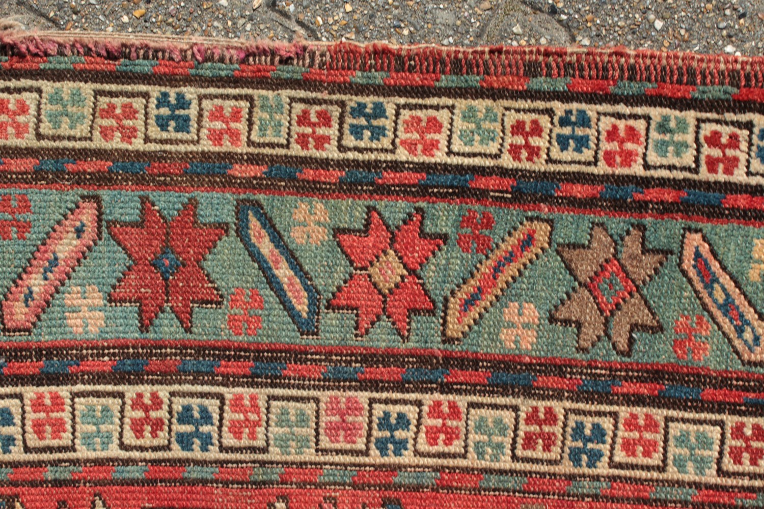 A CAUCASIAN RUNNER with typical motifs in red and blue. 10ft 9ins x 3ft 6ins. - Image 3 of 8