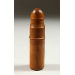 A TREEN CASED BULLET SHAPED SCENT BOTTLE. 7cms high.