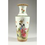 A CHINESE REPUBLIC PORCELAIN VASE decorated with figures in a garden setting. Printed mark. 11.