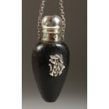 A VICTORIAN LEATHER BOUND SCENT BOTTLE, silver initials A. S. with silver cap and chain. Maker G. B.