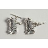 A PAIR OF NOVELTY MICHELIN MAN SILVER CUFFLINKS, boxed.