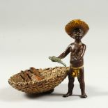 A VIENNA BRONZE LOBSTER BOY with a lobster in a large basket. 4cms high.