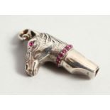 A NOVELTY SILVER HORSE WHISTLE. 4cms long.