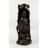 A LARGE CHINESE CARVED WOOD FIGURE OF GUANYIN. 18ins high.