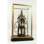 A GOOD BIG WHEEL SKELETON CLOCK in a glass case. 1ft 9ins high.