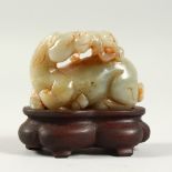 A CHINESE CARVED JADE HORSE AND MONKEY. 2cms long.
