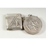 TWO SILVER GOLFING VESTA CASES.