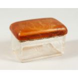 A GLASS BOX with plain horn top. 4.5ins long.