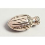 A SMALL VICTORIAN FLUTED SCENT BOTTLE with repousse stopper. Chester 1891. 4cms high.