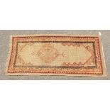 A PERSIAN TRIBAL SARAB RUNNER with long central motif and border. 7ft x 3ft 10ins.