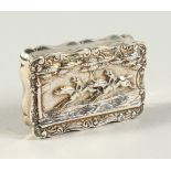 A VICTORIAN SNUFF BOX AND COVER, the lid repousse with two race horses and jockeys. Birmingham 1896.