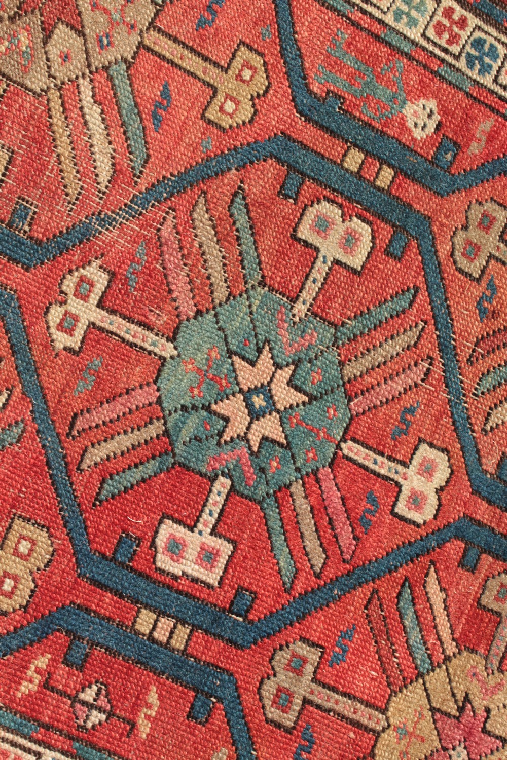 A CAUCASIAN RUNNER with typical motifs in red and blue. 10ft 9ins x 3ft 6ins. - Image 4 of 8