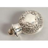 A VICTORIAN GREEN GLASS CIRCULAR SCENT BOTTLE AND STOPPER in a silver folding case. Chester 1900.