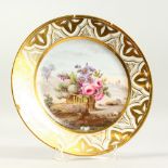 A GOOD DERBY BOTANICAL PLATE with gilt border. 9.5ins diameter.