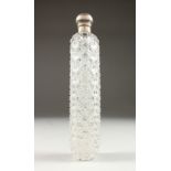 A SUPERB VICTORIAN CRYSTAL HOBNAIL CUT LONG SCENT BOTTLE with plain silver top. London 1881. Maker